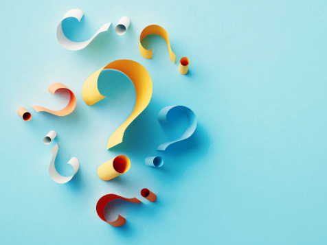 Colorful 3D question marks on a light blue background.