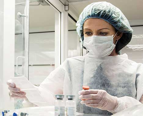 Pharmaceutical technician working in a lab