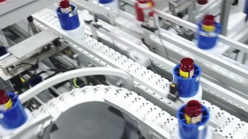 Inside of automated factory, packaging drugs