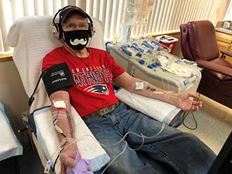 Scott Livingstone during his blood donation