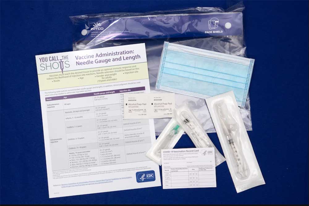 Contents contained inside a COVID-19 vaccine ancillary supply kit.