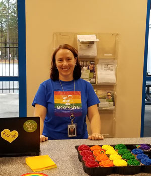 Debra wearing her McKesson Pride shirt at an event