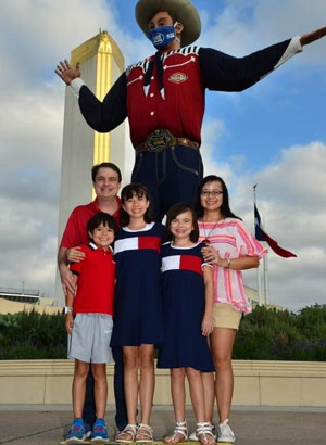 Alexandria, her husband and children attending the State Fair of Texas
