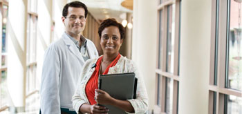 Pharmacy Future Two hospital workers stand together in a hallway