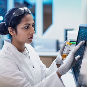 Pharmacy-Tech A Pharmacy Tech pushes the screen on a touchscreen computer