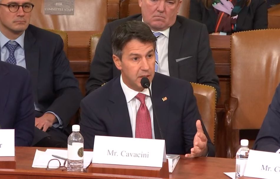 A man testifying before Congress.