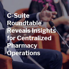 Person in a suit speaks into a microphone with text about centralized pharmacy operations insights.
