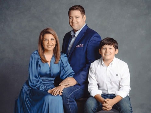 Carolina McDaniel and her husband and son.