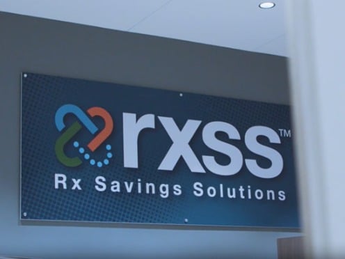 RxSS logo on a wall in an office.
