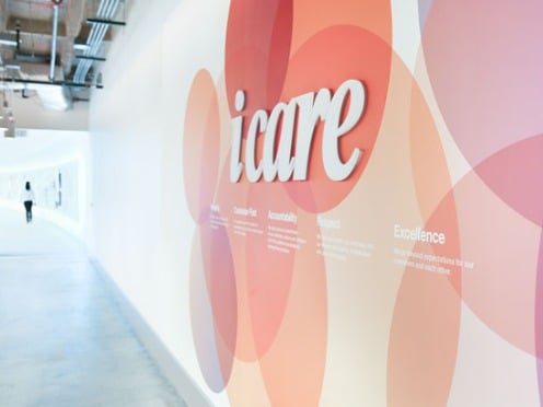 A sign on a wall displaying McKesson's ICARE values