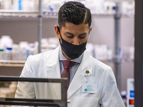 A pharmacist working in a pharmacy