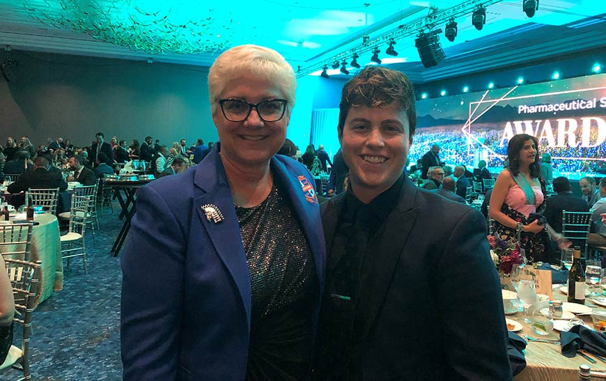Sharon and her daughter, UNITY founder Laura Longwell standing smiling with arms around each other