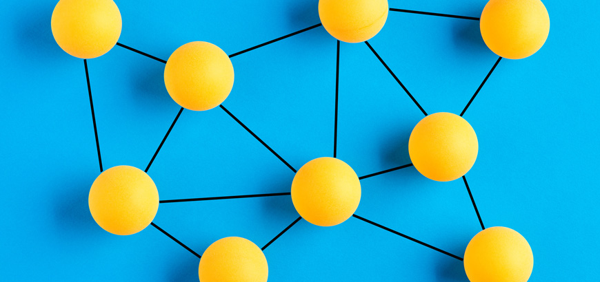 Yellow spheres connected by black lines on a blue background.